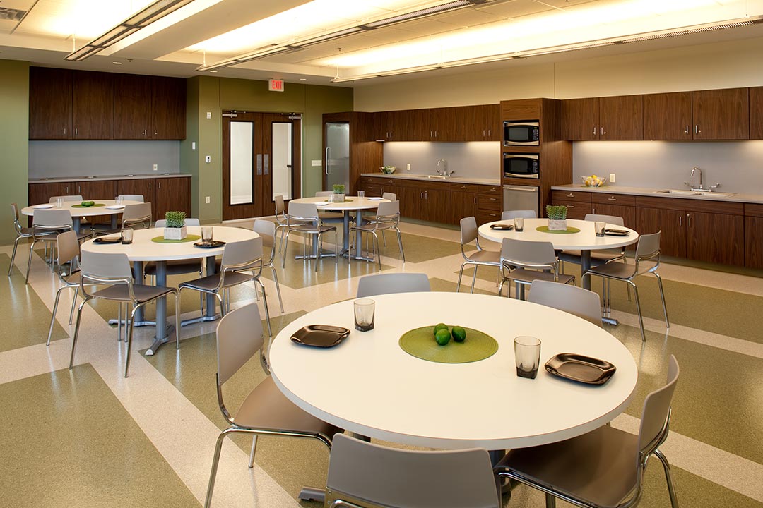 Spotless cafeteria at day services facility ready for mealtime