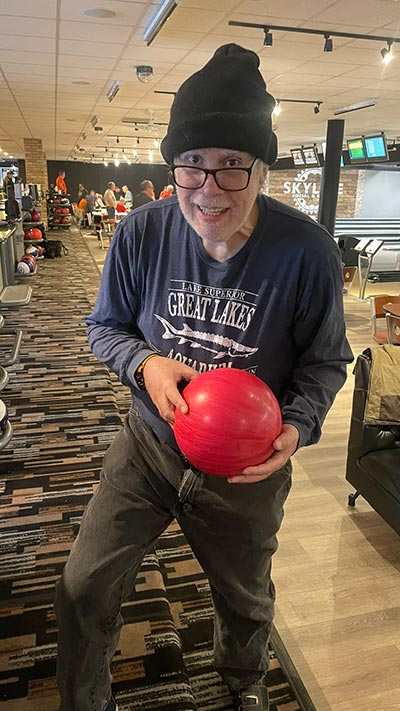 Day services client bowling at a local alley